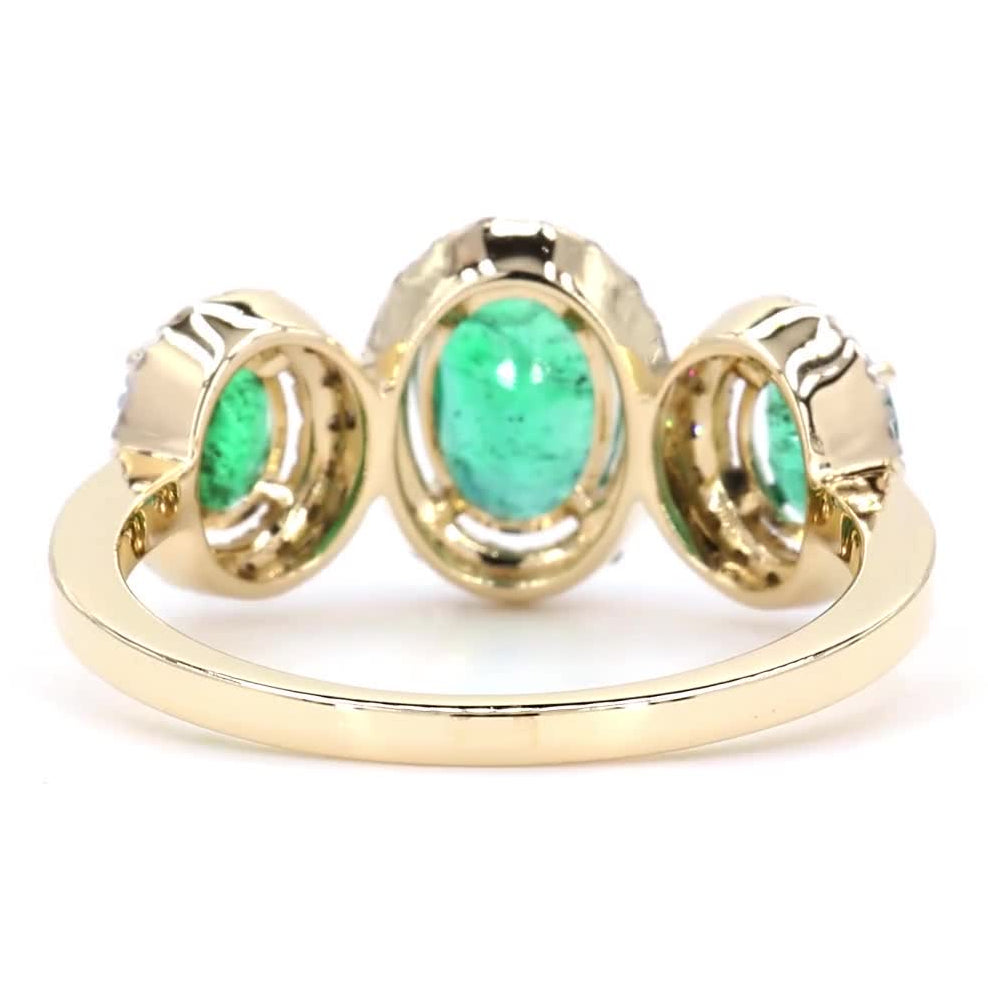 Three Oval Emerald Halo Diamond Ring