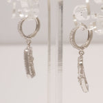 Load image into Gallery viewer, Geometric Bow Drop Huggie Earring