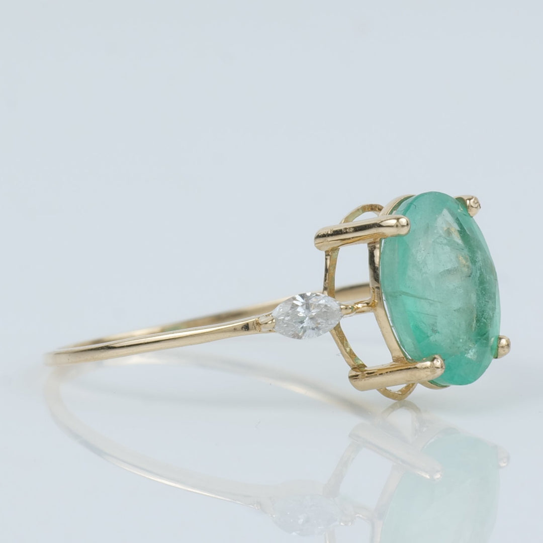 Oval Emerald Diamond Ring