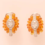 Load image into Gallery viewer, Oval Cluster Orange Sapphire Halo Huggie Earrings