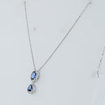 Load image into Gallery viewer, Oval Blue Sapphire Halo Necklace