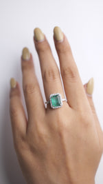 Load and play video in Gallery viewer, Emerald Halo Diamond Ring: 14k Gold Gemstone Engagement Jewelry