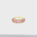 Load and play video in Gallery viewer, Oval Pink Sapphire Eternity Diamond Band Ring
