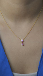 Load and play video in Gallery viewer, Oval Pink Sapphire Halo Diamond Necklace