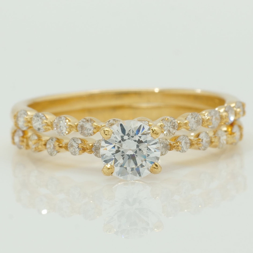Natural Solitaire Ring With Supporting Band