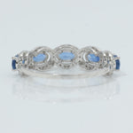 Load image into Gallery viewer, Oval Sapphire Halo Diamond Eternity Band Ring
