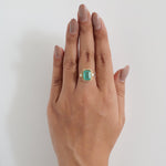 Load image into Gallery viewer, Green Emerald Cut Halo Diamond Ring
