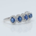 Load image into Gallery viewer, Oval Sapphire Halo Diamond Eternity Ring
