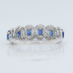 Load image into Gallery viewer, Oval Sapphire Halo Diamond Eternity Ring
