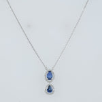 Load image into Gallery viewer, Oval Blue Sapphire Halo Necklace
