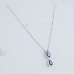 Load image into Gallery viewer, Oval Blue Sapphire Halo Necklace
