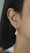 Load and play video in Gallery viewer, Pear Drop Diamond Earrings
